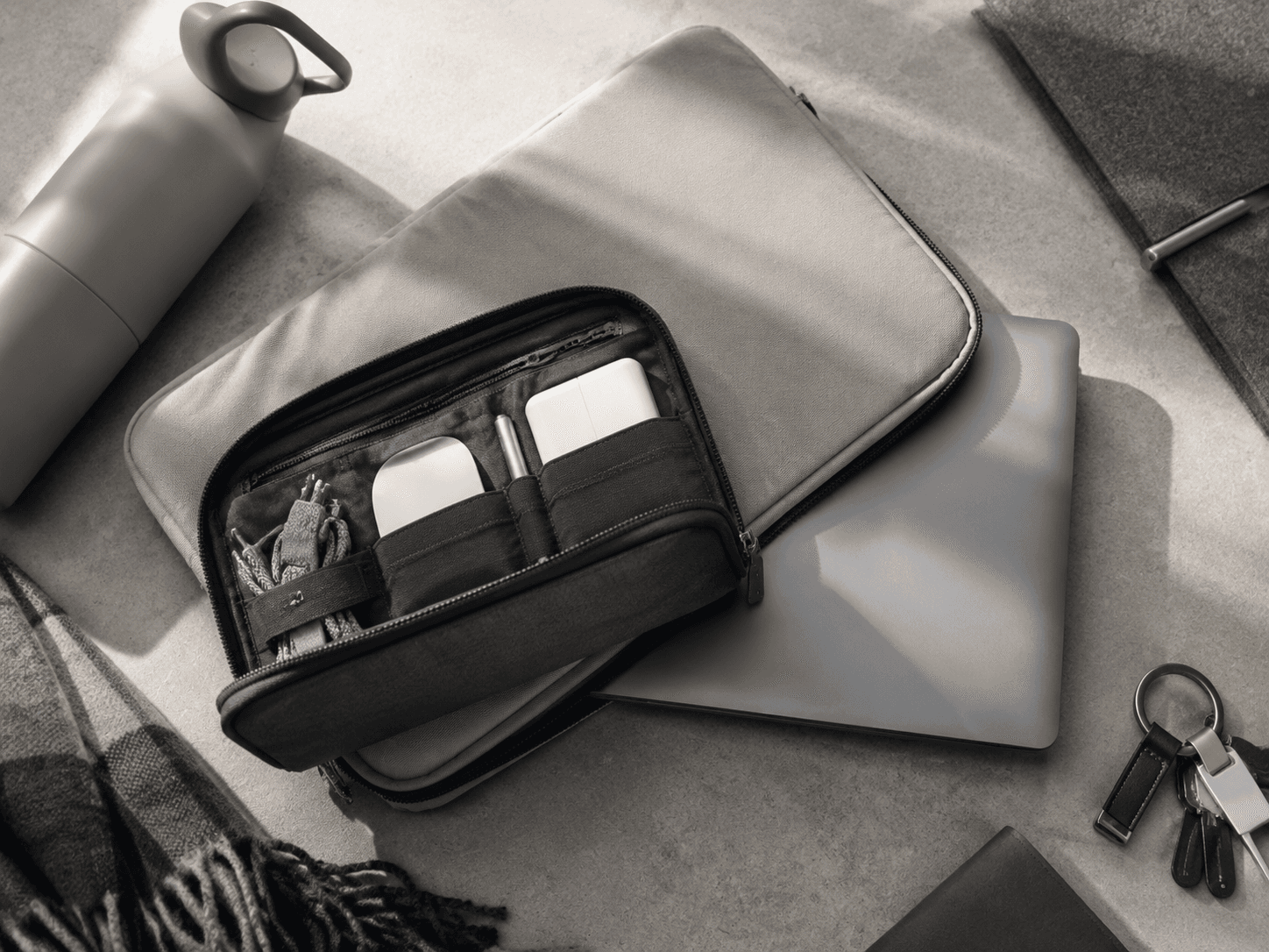 Sleeve + Pouch Travel Duo in graphite and silver finish
